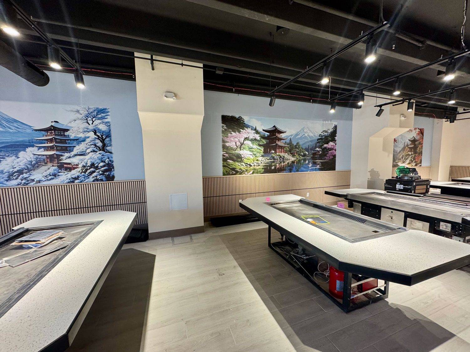 Vibrant custom murals printed directly on restaurant walls featuring Japanese pagodas and seasonal landscapes — commercial wall art installation by ArtWall Pro in Colorado